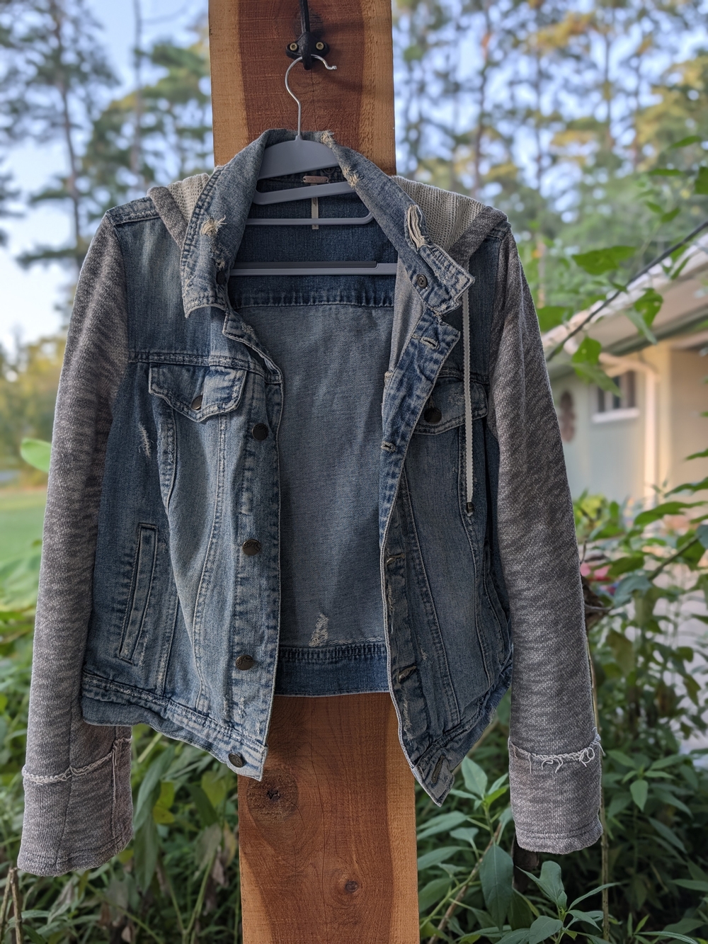 Free People. Washed Denim Jacket with Gray Knit Sleeves and Hood